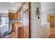 Kitchen featuring wood cabinets, laminate countertops, and an eat-in area at 5767 Tabitha Ave, Las Vegas, NV 89156