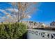 View of the street showcasing the beautiful mountain views, blue sky and palm trees at 5767 Tabitha Ave, Las Vegas, NV 89156