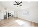 Bright and airy living room with hardwood floors and open concept design at 5840 N El Capitan Way, Las Vegas, NV 89149