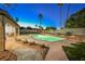 Inviting backyard oasis with a sparkling pool and relaxing patio at 5840 N El Capitan Way, Las Vegas, NV 89149