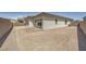 A level backyard featuring a brick patio perfect for outdoor seating or a barbecue area at 65 Ibiza Lake Dr, Henderson, NV 89011