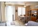 Charming dining area with wood floors and built-in hutch at 7566 Luna Del Rey St, Las Vegas, NV 89123