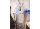 Photo of a water heater in a utility closet at 7566 Luna Del Rey St, Las Vegas, NV 89123