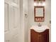 Cozy bathroom featuring a dark wood vanity with built-in storage at 8040 Marshall Canyon Dr, Las Vegas, NV 89166