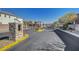 Gated community entrance with decorative stone pillar, ensuring privacy and security for residents at 8040 Marshall Canyon Dr, Las Vegas, NV 89166