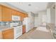 A bright kitchen with stainless steel appliances, ample counter space, and adjacent dining area at 8040 Marshall Canyon Dr, Las Vegas, NV 89166