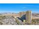 Highrise condo building with parking and views of surrounding area at 8255 Las Vegas Blvd # 1505, Las Vegas, NV 89123