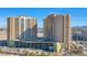 Twin highrise condo buildings with ample parking and landscaping at 8255 Las Vegas Blvd # 1505, Las Vegas, NV 89123