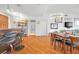 Open concept dining area with hardwood floors and modern chandelier at 8255 Las Vegas Blvd # 1505, Las Vegas, NV 89123