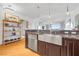 Modern kitchen with farmhouse sink, stainless steel appliances, and hardwood floors at 8255 Las Vegas Blvd # 1505, Las Vegas, NV 89123