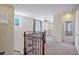 Spacious loft area with wood railing at 8261 Peaceful Mountain Ave, Las Vegas, NV 89178