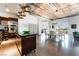 Modern kitchen with dark wood cabinets, stainless steel appliances, and kitchen island at 900 Las Vegas Blvd # 904, Las Vegas, NV 89101