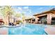 Inviting community pool with lounge chairs and landscaping at 9050 W Warm Springs Rd # 1137, Las Vegas, NV 89148