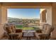 Relaxing balcony with stunning views and seating for two at 9204 Tesoras Dr # 401, Las Vegas, NV 89144