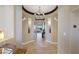 Grand entry with tile floors and a chandelier at 9204 Tesoras Dr # 401, Las Vegas, NV 89144