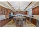 Gourmet kitchen with granite countertops and custom cabinetry at 9204 Tesoras Dr # 401, Las Vegas, NV 89144