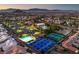 Aerial view of community amenities, including pool, tennis courts at 10813 Black Ledge Ave, Las Vegas, NV 89134