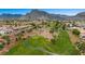 Aerial view showcasing community, golf course, and mountain views at 10813 Black Ledge Ave, Las Vegas, NV 89134