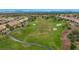 Aerial view of homes and golf course with mountain backdrop at 10813 Black Ledge Ave, Las Vegas, NV 89134