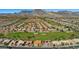 Aerial view of community highlighting its expansive golf course at 10813 Black Ledge Ave, Las Vegas, NV 89134