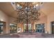 Elegant clubhouse interior with a stunning metal tree sculpture at 10813 Black Ledge Ave, Las Vegas, NV 89134