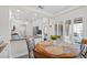 Bright dining area with a round table and four chairs near kitchen at 10813 Black Ledge Ave, Las Vegas, NV 89134