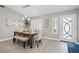 Bright dining area with wood table and neutral decor at 10813 Black Ledge Ave, Las Vegas, NV 89134