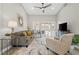 Relaxing living room with a large window, comfortable seating, and a stylish rug at 10813 Black Ledge Ave, Las Vegas, NV 89134