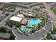 Aerial view of community pool, clubhouse, and tennis courts at 1112 Via San Pietro, Henderson, NV 89011