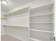 Large walk-in closet with ample shelving and rods at 1112 Via San Pietro, Henderson, NV 89011