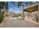 Expansive backyard with covered patio and pool at 1125 Neva Ranch Ave, North Las Vegas, NV 89081