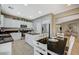 Well-equipped kitchen with white cabinets, granite countertops and stainless steel appliances at 1125 Neva Ranch Ave, North Las Vegas, NV 89081