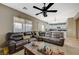 Open concept living room with a view into the kitchen area at 1125 Neva Ranch Ave, North Las Vegas, NV 89081