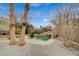 Relaxing kidney-shaped pool with rock waterfall feature at 1125 Neva Ranch Ave, North Las Vegas, NV 89081