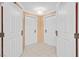 Bright entryway with two white doors and tiled floor at 135 E Harmon Ave # 718, Las Vegas, NV 89109