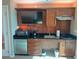 Small kitchen with microwave, sink, and mini-fridge at 135 E Harmon Ave # 718, Las Vegas, NV 89109