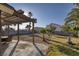 Large backyard with gravel and a pergola at 1702 La Cruz Dr, Henderson, NV 89014