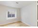 Simple bedroom with hardwood floors and window seat at 1702 La Cruz Dr, Henderson, NV 89014