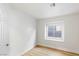 Simple bedroom with hardwood floors and window seat at 1702 La Cruz Dr, Henderson, NV 89014