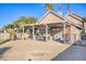 Covered patio with seating area, perfect for outdoor dining and entertaining at 1702 La Cruz Dr, Henderson, NV 89014