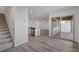 Carpeted staircase leading to the second floor, with views of the kitchen and backyard at 1716 Sandia Rock Ave, North Las Vegas, NV 89032