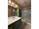 Clean bathroom with a walk-in shower and updated vanity at 1806 Discus Dr, Las Vegas, NV 89108