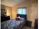 Spacious bedroom with a queen-size bed and dresser at 1806 Discus Dr, Las Vegas, NV 89108