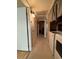 Clean hallway with access to laundry and other rooms at 1806 Discus Dr, Las Vegas, NV 89108