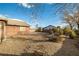 Backyard featuring desert landscaping, foliage and block wall that provides privacy at 210 Bristle Cone, Pahrump, NV 89048