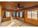 Enclosed sunroom featuring many windows to let in natural light, and a ceiling fan at 210 Bristle Cone, Pahrump, NV 89048