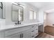 Updated bathroom with white vanity, quartz countertop, and a walk-in shower at 2113 La Harve Dr, Las Vegas, NV 89106