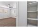 Spacious bedroom with plush carpeting and a large closet at 2113 La Harve Dr, Las Vegas, NV 89106