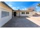 Side view of a single story home with a large yard and driveway at 2113 La Harve Dr, Las Vegas, NV 89106