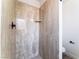 Walk-in shower with stylish marble-look walls at 2113 La Harve Dr, Las Vegas, NV 89106